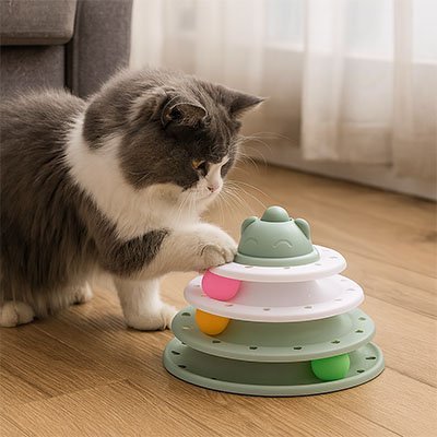 jouet pour chat vert et blanc